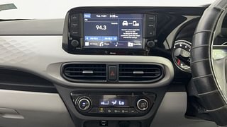 Used 2021 Hyundai Grand i10 Nios Sportz 1.2 Kappa VTVT Petrol Manual top_features Integrated (in-dash) music system