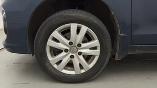 Used 2017 Maruti Suzuki Ertiga [2015-2018] ZXI+ Petrol Manual tyres LEFT FRONT TYRE RIM VIEW