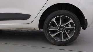 Used 2017 Hyundai Grand i10 [2017-2020] Sportz (O) AT 1.2 Kappa VTVT Petrol Automatic tyres LEFT REAR TYRE RIM VIEW