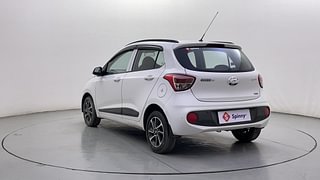 Used 2017 Hyundai Grand i10 [2017-2020] Sportz (O) AT 1.2 Kappa VTVT Petrol Automatic exterior LEFT REAR CORNER VIEW