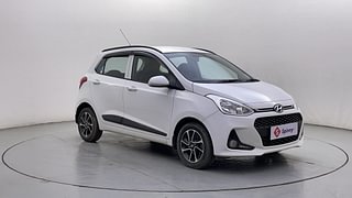 Used 2017 Hyundai Grand i10 [2017-2020] Sportz (O) AT 1.2 Kappa VTVT Petrol Automatic exterior RIGHT FRONT CORNER VIEW