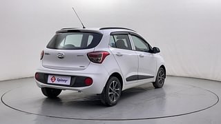Used 2017 Hyundai Grand i10 [2017-2020] Sportz (O) AT 1.2 Kappa VTVT Petrol Automatic exterior RIGHT REAR CORNER VIEW