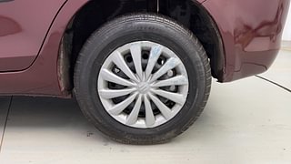 Used 2015 Maruti Suzuki Swift Dzire VXI Petrol Manual tyres LEFT REAR TYRE RIM VIEW