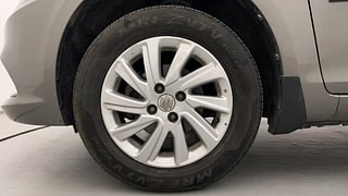 Used 2015 Maruti Suzuki Swift Dzire ZXI Petrol Manual tyres LEFT FRONT TYRE RIM VIEW