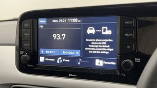 Used 2021 Hyundai Grand i10 Nios Sportz 1.2 Kappa VTVT Petrol Manual top_features Integrated (in-dash) music system