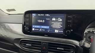 Used 2021 Hyundai Grand i10 Nios Sportz 1.2 Kappa VTVT Petrol Manual top_features Integrated (in-dash) music system