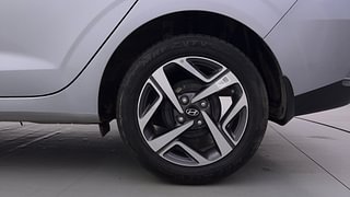 Used 2023 Hyundai Aura SX 1.2 Petrol Petrol Manual tyres LEFT REAR TYRE RIM VIEW