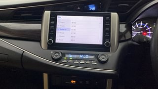 Used 2023 Toyota Innova Crysta 2.7 VX 7 STR Petrol Manual interior MUSIC SYSTEM & AC CONTROL VIEW