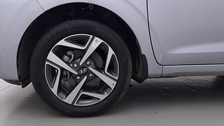 Used 2023 Hyundai Aura SX 1.2 Petrol Petrol Manual tyres LEFT FRONT TYRE RIM VIEW