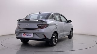 Used 2023 Hyundai Aura SX 1.2 Petrol Petrol Manual exterior RIGHT REAR CORNER VIEW