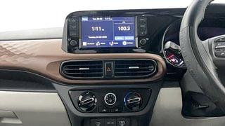 Used 2023 Hyundai Aura SX 1.2 CNG Petrol+cng Manual interior MUSIC SYSTEM & AC CONTROL VIEW