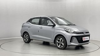 Used 2023 Hyundai Aura SX 1.2 CNG Petrol+cng Manual exterior RIGHT FRONT CORNER VIEW