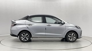 Used 2023 Hyundai Aura SX 1.2 CNG Petrol+cng Manual exterior RIGHT SIDE VIEW
