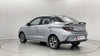 Used 2023 Hyundai Aura SX 1.2 CNG Petrol+cng Manual exterior LEFT REAR CORNER VIEW
