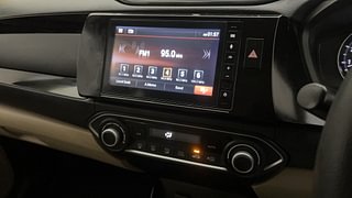 Used 2020 honda Amaze 1.2 VX CVT i-VTEC Petrol Automatic top_features Integrated (in-dash) music system