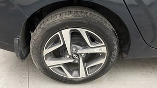 Used 2023 Hyundai Aura SX 1.2 Petrol Petrol Manual tyres RIGHT REAR TYRE RIM VIEW