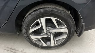 Used 2023 Hyundai Aura SX 1.2 Petrol Petrol Manual tyres LEFT REAR TYRE RIM VIEW
