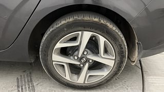 Used 2021 Hyundai Aura SX 1.2 (O) Petrol Petrol Manual tyres LEFT REAR TYRE RIM VIEW