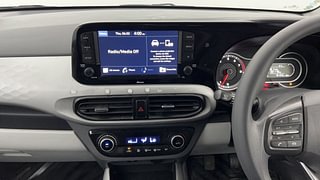 Used 2021 Hyundai Grand i10 Nios Sportz 1.2 Kappa VTVT Petrol Manual interior MUSIC SYSTEM & AC CONTROL VIEW