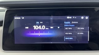 Used 2022 Mahindra XUV700 AX 3 Diesel AT 5 STR Diesel Automatic top_features Integrated (in-dash) music system