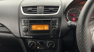 Used 2015 Maruti Suzuki Swift [2011-2017] VXi Petrol Manual top_features Integrated (in-dash) music system