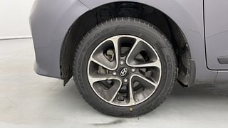 Used 2019 Hyundai Grand i10 [2017-2020] Sportz AT 1.2 Kappa VTVT Petrol Automatic tyres LEFT FRONT TYRE RIM VIEW