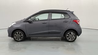 Used 2019 Hyundai Grand i10 [2017-2020] Sportz AT 1.2 Kappa VTVT Petrol Automatic exterior LEFT SIDE VIEW