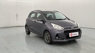 Used 2019 Hyundai Grand i10 [2017-2020] Sportz AT 1.2 Kappa VTVT Petrol Automatic exterior RIGHT FRONT CORNER VIEW