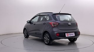 Used 2018 Hyundai Grand i10 [2017-2020] Sportz (O) AT 1.2 Kappa VTVT Petrol Automatic exterior LEFT REAR CORNER VIEW