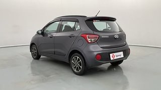 Used 2019 Hyundai Grand i10 [2017-2020] Sportz AT 1.2 Kappa VTVT Petrol Automatic exterior LEFT REAR CORNER VIEW