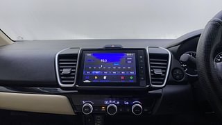 Used 2022 Honda City V CVT Petrol Automatic top_features Integrated (in-dash) music system