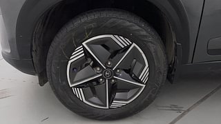 Used 2024 Tata Nexon Creative Plus (S) 1.2 Petrol 7DCA Dual Tone Petrol Automatic tyres LEFT FRONT TYRE RIM VIEW