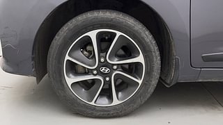 Used 2018 Hyundai Grand i10 [2017-2020] Asta 1.2 Kappa VTVT Petrol Manual tyres LEFT FRONT TYRE RIM VIEW