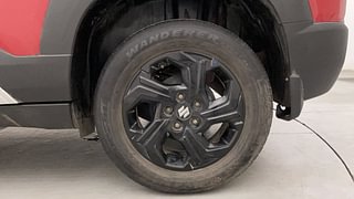 Used 2023 Maruti Suzuki Brezza ZXI AT Dual Tone Petrol Automatic tyres LEFT REAR TYRE RIM VIEW