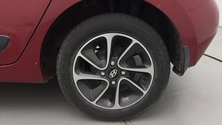 Used 2017 Hyundai Grand i10 [2017-2020] Sportz (O) AT 1.2 Kappa VTVT Petrol Automatic tyres LEFT REAR TYRE RIM VIEW
