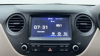 Used 2017 Hyundai Grand i10 [2017-2020] Sportz (O) AT 1.2 Kappa VTVT Petrol Automatic top_features Integrated (in-dash) music system