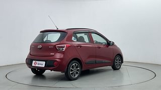 Used 2017 Hyundai Grand i10 [2017-2020] Sportz (O) AT 1.2 Kappa VTVT Petrol Automatic exterior RIGHT REAR CORNER VIEW