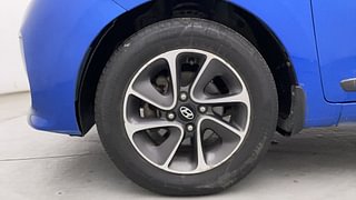 Used 2019 Hyundai Grand i10 Sportz AT 1.2 Kappa VTVT Petrol Automatic tyres LEFT FRONT TYRE RIM VIEW