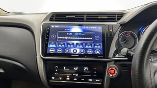 Used 2017 honda City V 4th Gen Petrol Manual top_features Integrated (in-dash) music system
