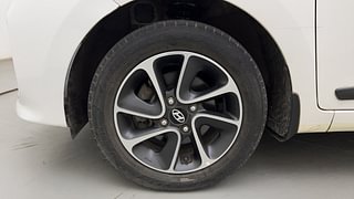 Used 2018 Hyundai Grand i10 [2017-2020] Sportz AT 1.2 Kappa VTVT Petrol Automatic tyres LEFT FRONT TYRE RIM VIEW