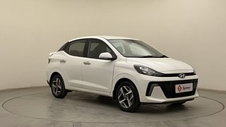 Used 2023 Hyundai Aura SX 1.2 CNG Petrol+cng Manual exterior RIGHT FRONT CORNER VIEW