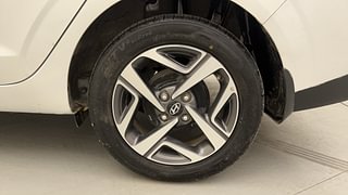 Used 2023 Hyundai Aura SX 1.2 CNG Petrol+cng Manual tyres LEFT REAR TYRE RIM VIEW