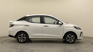 Used 2023 Hyundai Aura SX 1.2 CNG Petrol+cng Manual exterior RIGHT SIDE VIEW
