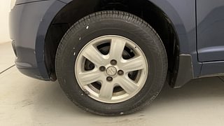 Used 2010 Maruti Suzuki Swift Dzire ZXi Petrol Manual tyres LEFT FRONT TYRE RIM VIEW
