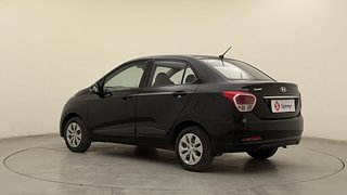 Used 2014 Hyundai Xcent [2014-2017] S Petrol Petrol Manual exterior LEFT REAR CORNER VIEW