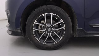 Used 2022 Maruti Suzuki Swift ZXI Plus AMT Dual Tone Petrol Automatic tyres LEFT FRONT TYRE RIM VIEW