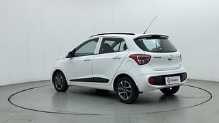 Used 2019 Hyundai Grand i10 [2017-2020] Sportz AT 1.2 Kappa VTVT Petrol Automatic exterior LEFT REAR CORNER VIEW