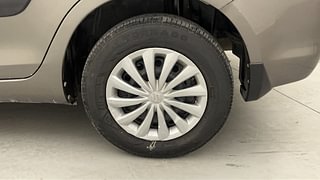 Used 2015 Maruti Suzuki Swift Dzire VXI Petrol Manual tyres LEFT REAR TYRE RIM VIEW