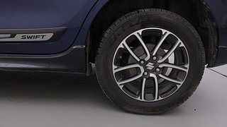 Used 2022 Maruti Suzuki Swift ZXI Plus AMT Dual Tone Petrol Automatic tyres LEFT REAR TYRE RIM VIEW