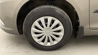 Used 2015 Maruti Suzuki Swift Dzire VXI Petrol Manual tyres LEFT FRONT TYRE RIM VIEW